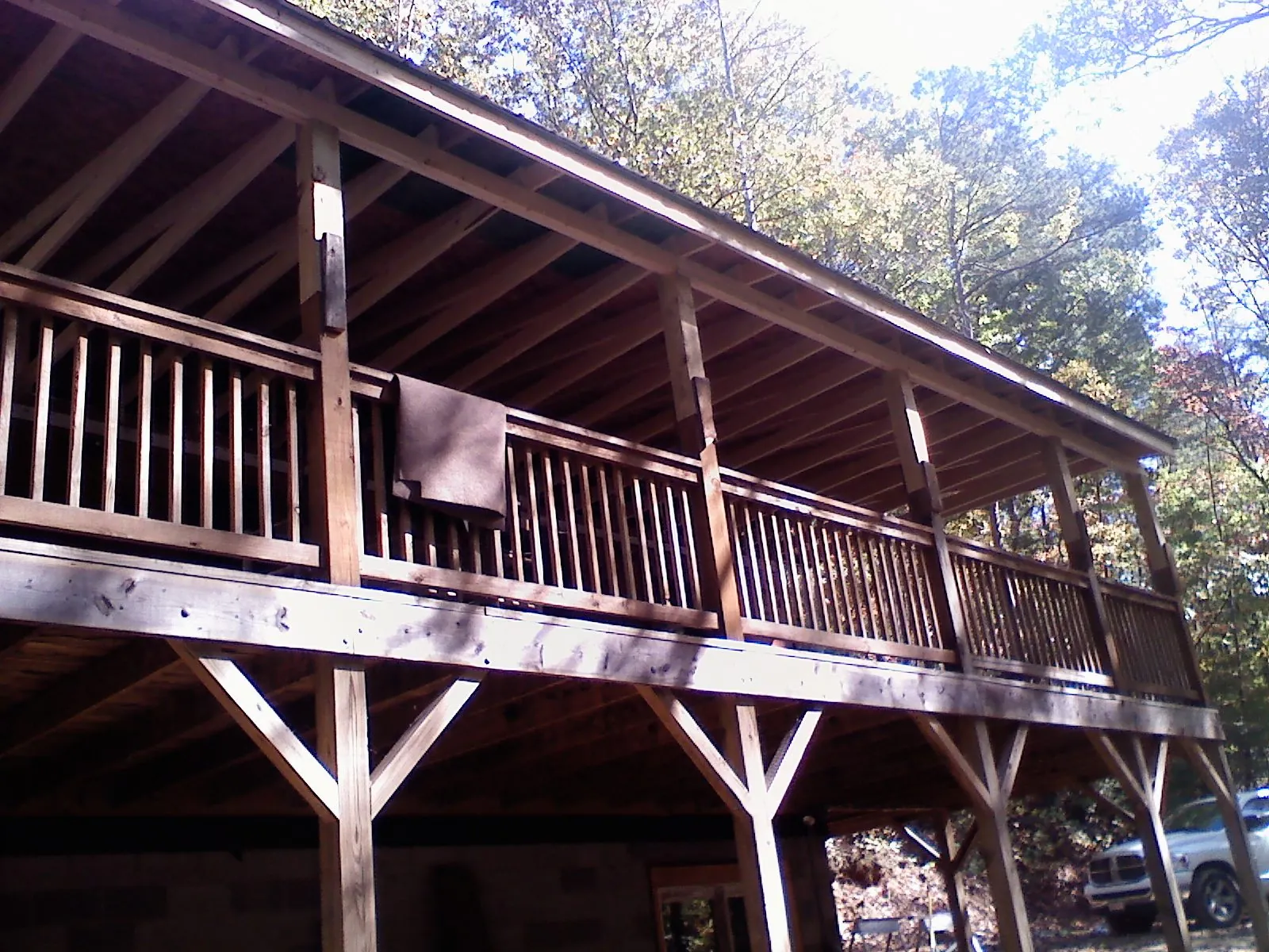 Timber framing under a new elevated porch and deck — Roof Leak Repair in Surgoinsville by Roofing Brothers